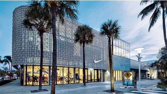 Nike store surrounded by palm trees