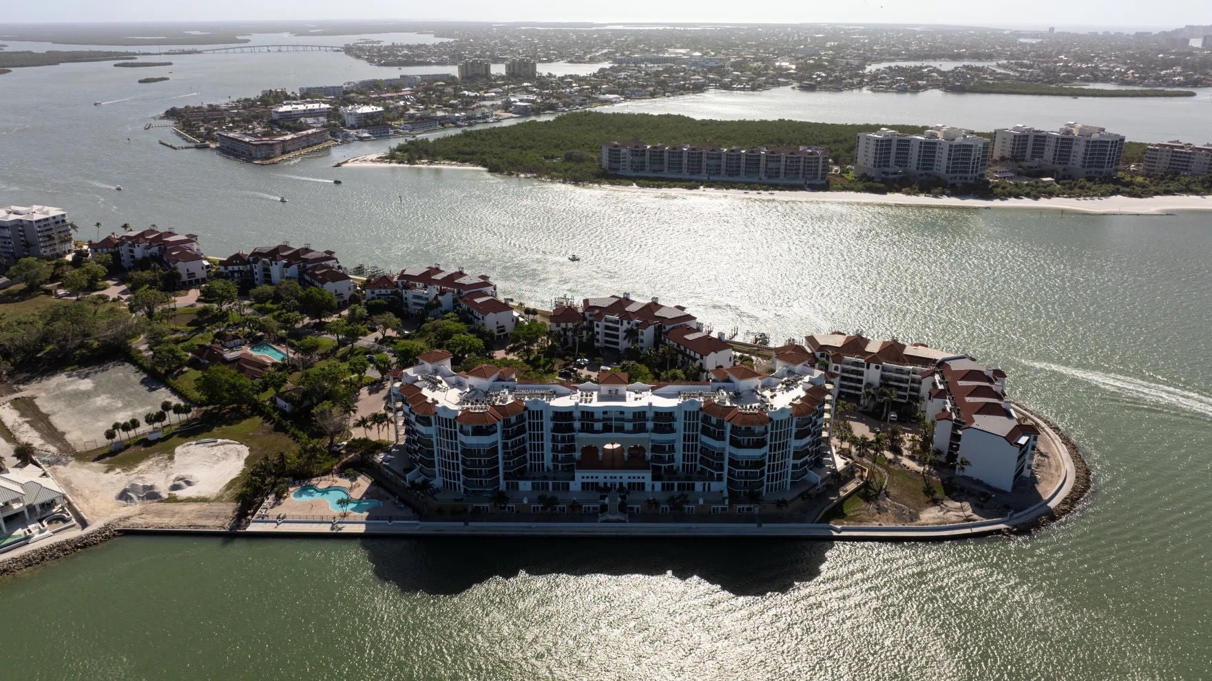 The Twin Dolphins Condominiums and several residential buildings surrounded by waterways